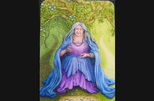 A tarot card titled II - The Wisewoman from the Forest of Enchantment Tarot shows an elderly woman with long white hair and a flowing blue and purple gown, sitting beneath a tree and holding runes, with a mystical atmosphere. Deck Review is written above.
