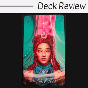 A tarot card from the Light Seers Tarot titled 2. The High Priestess shows a red-haired woman with closed eyes, adorned with jewelry and a crescent moon crown, against a mystical pink and teal background. Deck Review is written above the card.