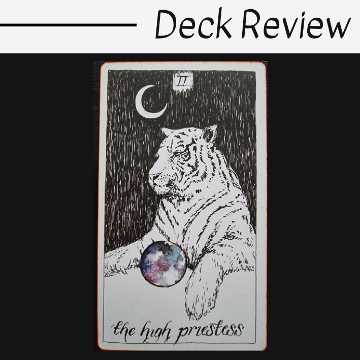 A tarot card illustration of a white tiger sits beneath a crescent moon, holding a sphere with a galaxy pattern. The card is labeled The High Priestess from The Wild Unknown Tarot. Deck Review is written above the card.