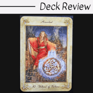 A tarot card from the Llewellyn Tarot titled Wheel of Fortune features a woman in a red robe seated beside a glowing, intricate wheel with Celtic designs. The card has ornate borders and the word Arianrhod at the top.