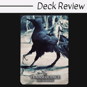 A tarot card from the Magick of You Oracle titled Translucence: Love the darkness shows a woman with long hair riding a large black crow through a mystical, foggy forest. The image has an ethereal, dreamlike quality.