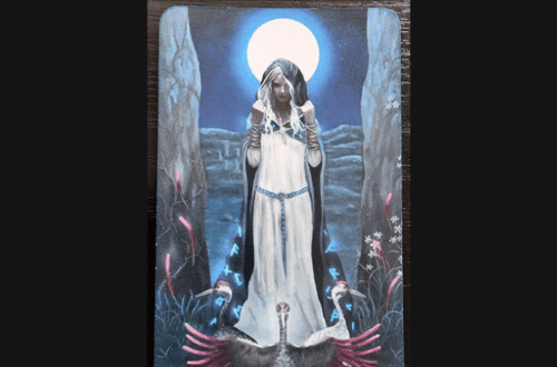 A tarot card from the Universal Celtic Tarot titled The High Priestess shows a woman in a white dress standing between two stone pillars under a full moon, with birds and flowers at her feet. Deck Review is written above the card.