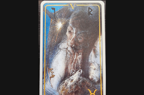 A tarot card titled The Hierophant from the Haindl Tarot shows a mystical figure with a long beard, surrounded by light and symbols, set against a blue and gold background. Deck Review is written above the card.