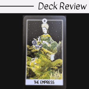 A tarot card from The Intuitive Night Goddess Tarot features The Empress, crowned and surrounded by lush greenery, flowers, and a waterfall beneath a starry sky. The words Deck Review appear above the card.