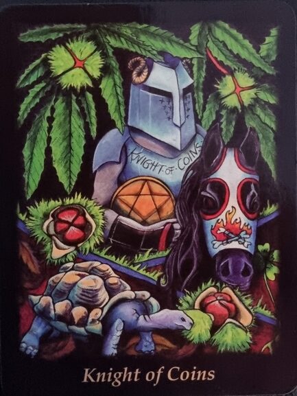 A tarot card from the Bonefire Tarot titled Knight of Coins shows an armored knight holding a gold coin, riding a black horse with a decorated mask. Vibrant turtles, green leaves, acorns, and mushrooms surround them.