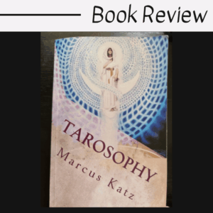 A book titled Tarosophy by Marcus Katz is shown on a dark surface. The Tarosophy cover features mystical artwork with a central figure, swirling patterns, and a blue and purple color scheme. Book Review is written above the image.