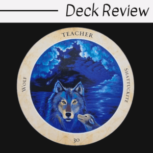 A circular card from the Crystal Medicine Oracle featuring a wolf and pup against a blue, cloudy night sky. The border reads Wolf, Teacher, Shattuckite, and 30. The top of the image says Deck Review.