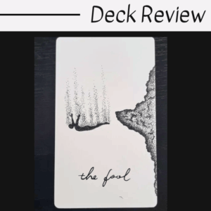 A minimalist tarot card titled The Fool from The Wandering Moon Tarot shows a figure falling headfirst off a cliff, drawn in black ink on a white background. The upper text reads Deck Review on a white banner.