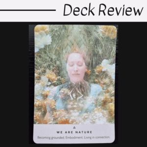 A tarot card titled We Are Nature from The Rose Oracle shows a person lying in grass and flowers, eyes closed, surrounded by greenery. The caption reads: Becoming grounded. Embodiment. Living in connection. The image is labeled Deck Review.