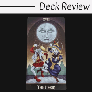 A tarot card from the Deviant Moon Tarot titled The Moon shows two puppet-like figures dancing beneath a large, expressive full moon with a face. The background is dark with a cityscape silhouette. Deck Review appears above the card.