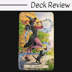 A card from the Everyday Witch Tarot labeled “20 • Judgement” shows a witch in striped stockings and a pointed hat playing a trumpet, with her black cat dancing nearby as musical notes swirl through the colorful outdoor scene.