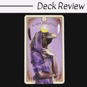 A tarot card from The Tarot of Curious Creatures titled The High Priestess shows a figure with a raven’s head and human body, draped in a purple veil. Above, “Deck Review” appears on a white background.