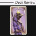 A tarot card from The Tarot of Curious Creatures titled The High Priestess shows a figure with a raven’s head and human body, draped in a purple veil. Above, “Deck Review” appears on a white background.
