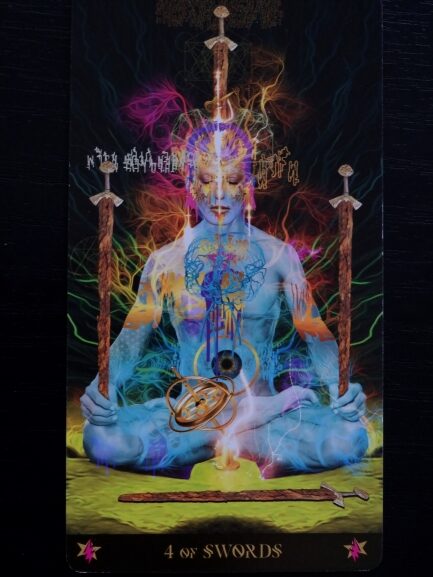 A vibrant Starman Tarot card titled 6 of Pentacles shows a figure with a tiger head, wings, and tree-like legs handing pentacles to a human figure. An upside-down human silhouette appears in the orange-yellow background.