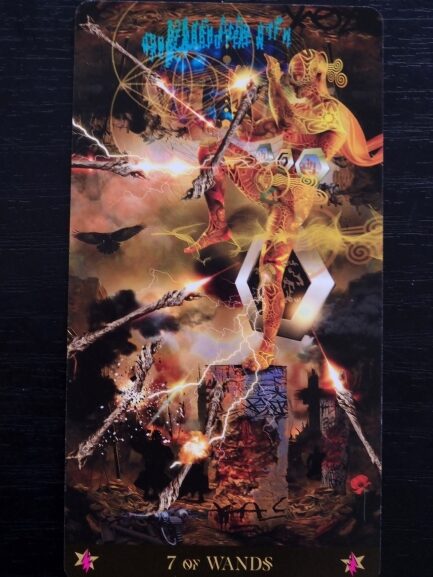 A fantasy-style Starman Tarot card depicts a determined figure on a stone pedestal, fending off six attacking wands with one of their own. Lightning, swirling symbols, and vivid colors surround them. The card reads 7 of Wands.