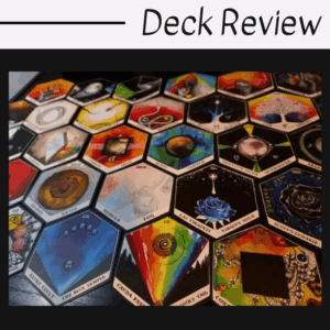 A colorful array of hexagonal tarot cards from The Wild Unknown Alchemy Deck, featuring unique, detailed illustrations and symbols, arranged in a spread. The image has “Deck Review” written at the top in bold text.