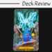 A colorful Tarot in Wonderland card titled The Magician shows a blue caterpillar with arms, holding magical items, sitting on a mushroom. In the background, a butterfly-shaped mist with symbols appears over grass and mushrooms.