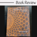 Journaling the Tarot: Evolutions by Andy Matzner features a geometric, mosaic-style patterned cover in brown and blue tones. Above the book is the text “Book Review” on a white background.