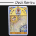 A tarot card labeled Fortune from the Oracle of the Radiant Sun shows a radiant sun with a face, stars, a serpent wrapped around a red flower, and part of the Earth below. Deck Review is written at the top.