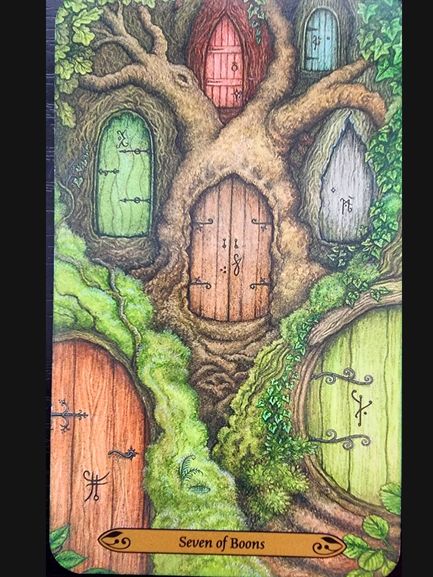 An illustrated tree with seven colorful doors set into its trunk and branches, each unique in color, design, and adorned with subtle writing. A banner at the bottom reads “Seven of Boons.” The scene is lush with greenery and moss.