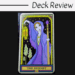 A colorful tarot card titled The Hermit from The Wandering Star Tarot features a robed figure holding a lantern and staff, surrounded by plants. The card’s border reads Healing, Solitude, Inner Work. Text above says Deck Review.
