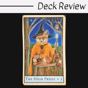 A tarot card from The Bohemian Animal Tarot titled The High Priest shows an orange cat in a wizard hat and robe holding a staff, with a squirrel, owl, mushrooms, and chalice on a tree stump. The top text reads Deck Review.