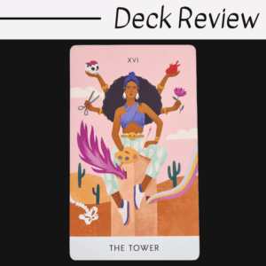 A tarot card titled The Tower from Tarot Cards of Modern Goddesses features a woman with multiple arms holding various artistic tools, set against a desert landscape with cacti and a pink sky. Deck Review is written at the top.