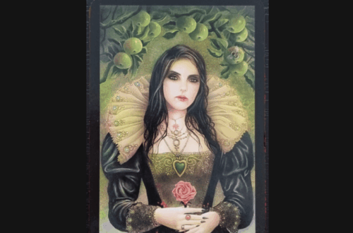 A tarot card titled The Empress from The Tarot of Vampyres shows a dark-haired woman in a black dress with gold trim and a ruffled collar, standing before a green background with apples and leaves. Text above reads Deck Review.