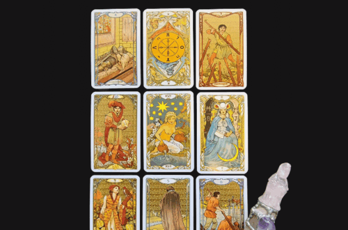 A nine-card general spread tarot layout features illustrated cards in three rows of three, with a pink crystal wand on a black background. The heading reads Tarot Spread at the top.