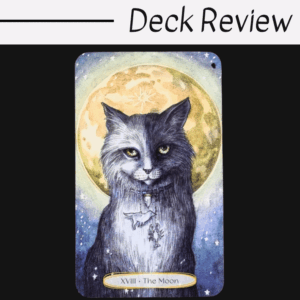 A tarot card from the Soul Cats Tarot titled XVIII - The Moon shows a black and white cat with yellow eyes, sitting before a glowing full moon, wearing a necklace with fish and leaf charms. The text Deck Review appears above.