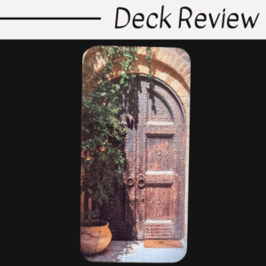 A tarot card from Divine Doors features an ornate, arched wooden door surrounded by stone and greenery, including a potted plant, set against a black background. The top text reads Deck Review.