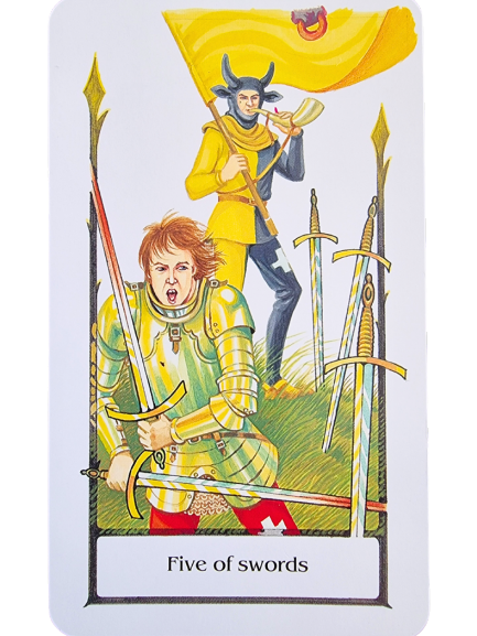 A Tarot of the Old Path card labeled Five of Swords shows an armored figure holding swords with a defiant expression, while another in the background holds a trumpet and a yellow flag with a bull’s head symbol.