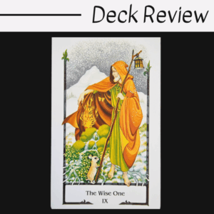 A tarot card from the Tarot of the Old Path titled The Wise One IX shows a hooded figure in orange and green robes holding a staff and lantern, standing in a snowy landscape with a deer and a fox beside them. Deck Review is written above.