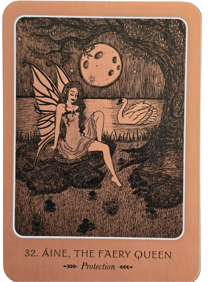 A fairy with wings sits on a tree root by a swan, beneath a full moon with craters. Framed in orange, the scene echoes the spirit of the Wild Woman Oracle. Text reads: 32. Áine, The Faery Queen — Protection.