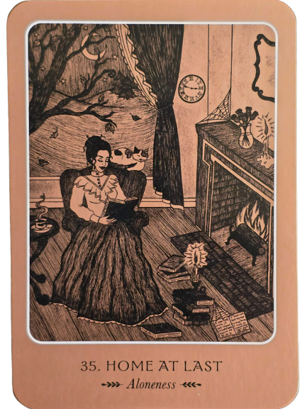 A woman sits in an armchair reading by a lit fireplace, her cat perched on the chair’s back. Moonlight streams through dark curtains. Books and a teacup lie nearby. The Wild Woman Oracle card reads: “35. Home At Last - Aloneness.”.