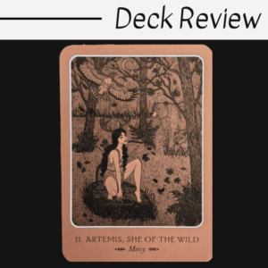 A tarot card titled 11. Artemis, She of the Wild – Mercy shows a woman with long dark hair sitting in a forest, with an owl flying above and a bear among the trees. Deck Review is written above, inspired by the spirit of the Wild Woman Oracle.