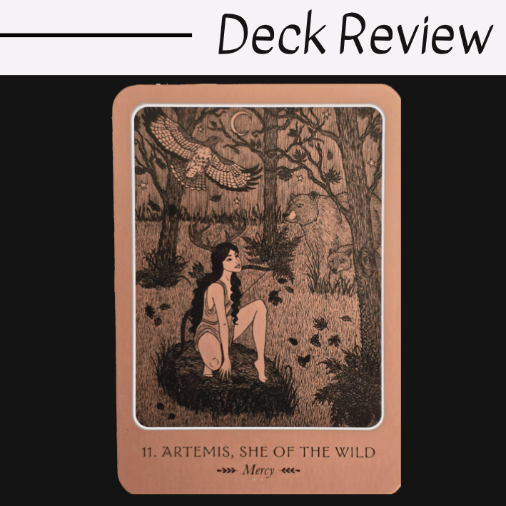 A tarot card titled 11. Artemis, She of the Wild – Mercy shows a woman with long dark hair sitting in a forest, with an owl flying above and a bear among the trees. Deck Review is written above, inspired by the spirit of the Wild Woman Oracle.