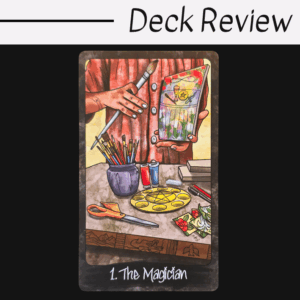 Illustrated tarot card titled The Magician from the Out of Hand Tarot shows a person holding a paintbrush and canvas, with art supplies like scissors, paint, pencils, and flowers on a table. Text above reads Deck Review.