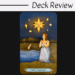 A tarot card titled XVII - The Star from the Good Fortune Tarot shows a woman in a blue dress kneeling by a pond, gazing up at a smiling, radiant star among smaller stars. A white animal sits beside her. Text above reads Deck Review.