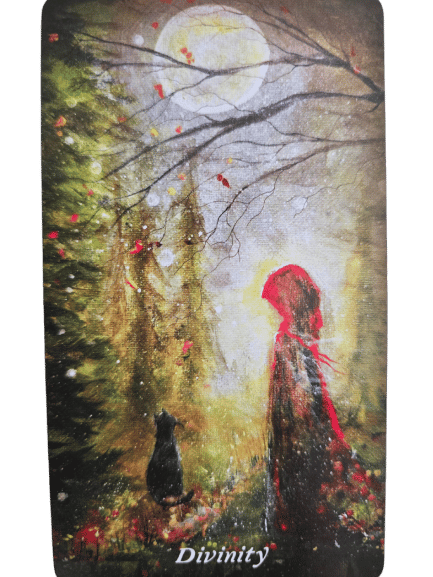 A person in a red cloak stands in a sunlit forest, facing a black cat beneath the glowing moon. Leaves gently fall, and Earthly Souls and Spirits Moon Oracle glows at the bottom, with Divinity elegantly written below.