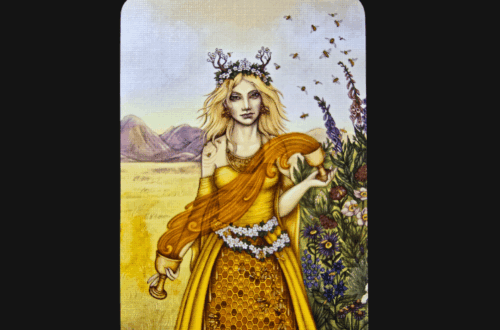 A tarot card titled XIV • Temperance from the Bee Tarot deck shows a serene woman in a golden dress standing in a vibrant field with mountains, holding a vessel, with flowers and birds around her. Text above reads, Deck Review.