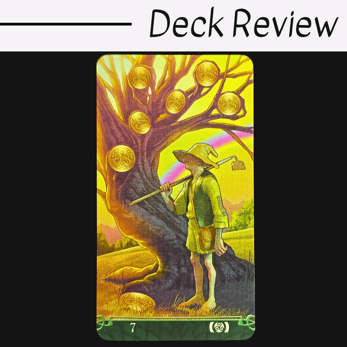 A card from Tarot at the End of the Rainbow with the number 7 shows a person in a hat holding a hoe, standing by a tree with seven gold pentacles among its branches. The background glows yellow, with a vibrant rainbow and lush green landscape.