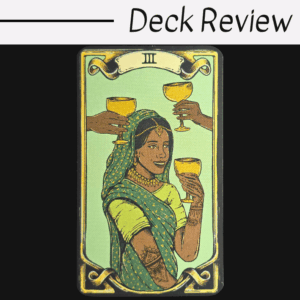 A tarot card from The Sacred Sisterhood Tarot titled III shows a smiling woman in green and gold traditional attire, holding a golden cup, with two hands holding cups above her. The words Deck Review appear at the top.