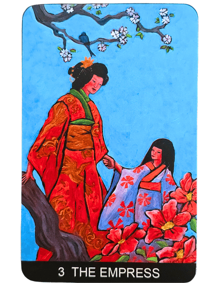 A Tarot de St. Croix card titled 3 THE EMPRESS shows an empress in ornate red and gold robes among blooming flowers, with a woman in a blue kimono holding her hand. The sky is blue, adorned with branches and blossoms above.