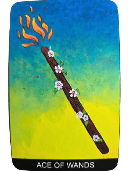 An illustration of the Ace of Wands tarot card from Tarot de St. Croix, showing a wooden wand with white flowers and green leaves, its tip ablaze with orange flames, set against a vibrant blue and yellow background.