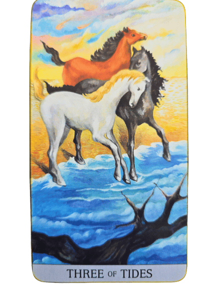 Three horses—white, black, and brown—gallop along the shore beneath a vibrant sky in this Japaridze Tarot scene. The ocean and golden sunlight shimmer in the background. The card is labeled Three of Tides.
