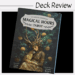A box of Magical Hours Tarot cards, featuring artwork of a serene figure with antlers and a bird, surrounded by greenery and golden orbs. The words Magical Hours Tarot Deck Review appear above the box.
