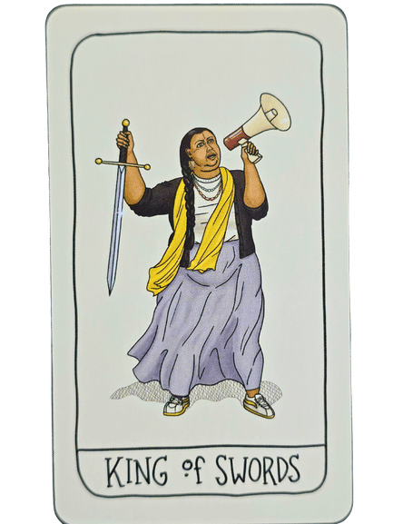 An illustrated Fifth Spirit Tarot card labeled King of Swords depicts a woman in a skirt, sneakers, and a yellow scarf. She holds a sword in one hand and a megaphone in the other, looking determined and outspoken.