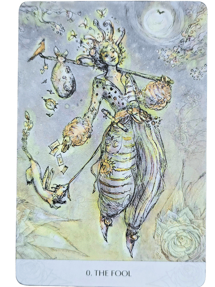 A whimsical figure in colorful clothes walks with a stick and bundle over their shoulder, accompanied by a playful dog. The Magicmakers Tarot card, titled 0. THE FOOL, features dreamy artwork with floating leaves and a bright moon.