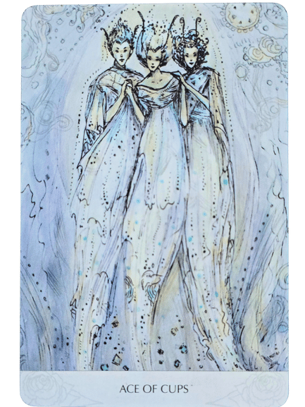 An ethereal illustration from the Magicmakers Tarot shows three elegant, feminine figures in flowing blue and white gowns, standing closely together. The card is titled Ace of Cups at the bottom in uppercase letters.